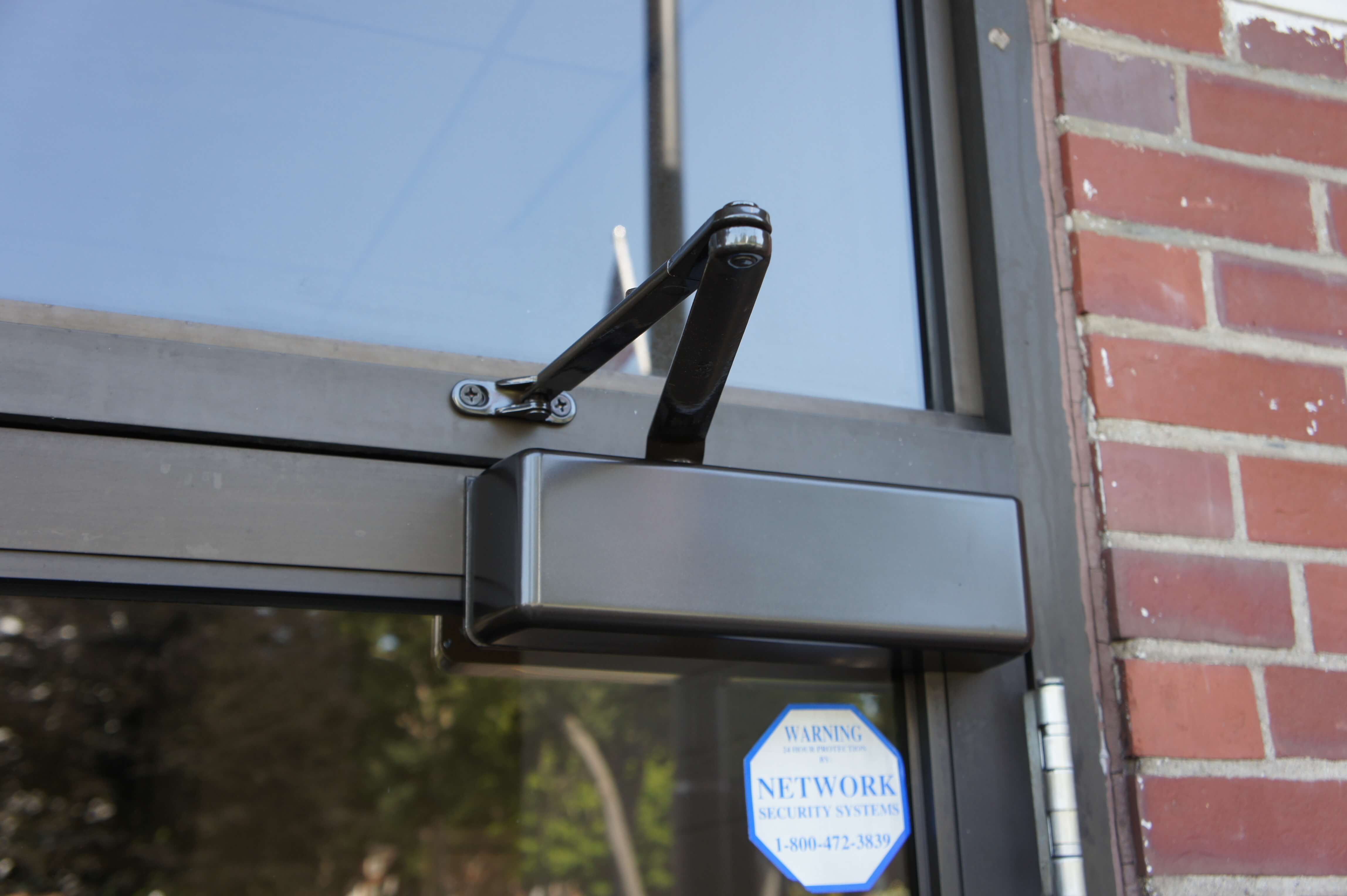 Closer installed on the exterior of a building door