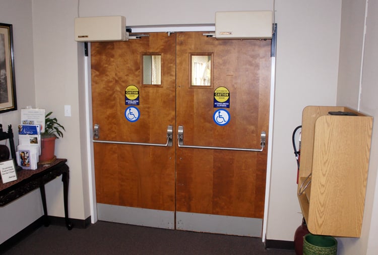 Model 4300XR automatic door openers installed on set of office double doors