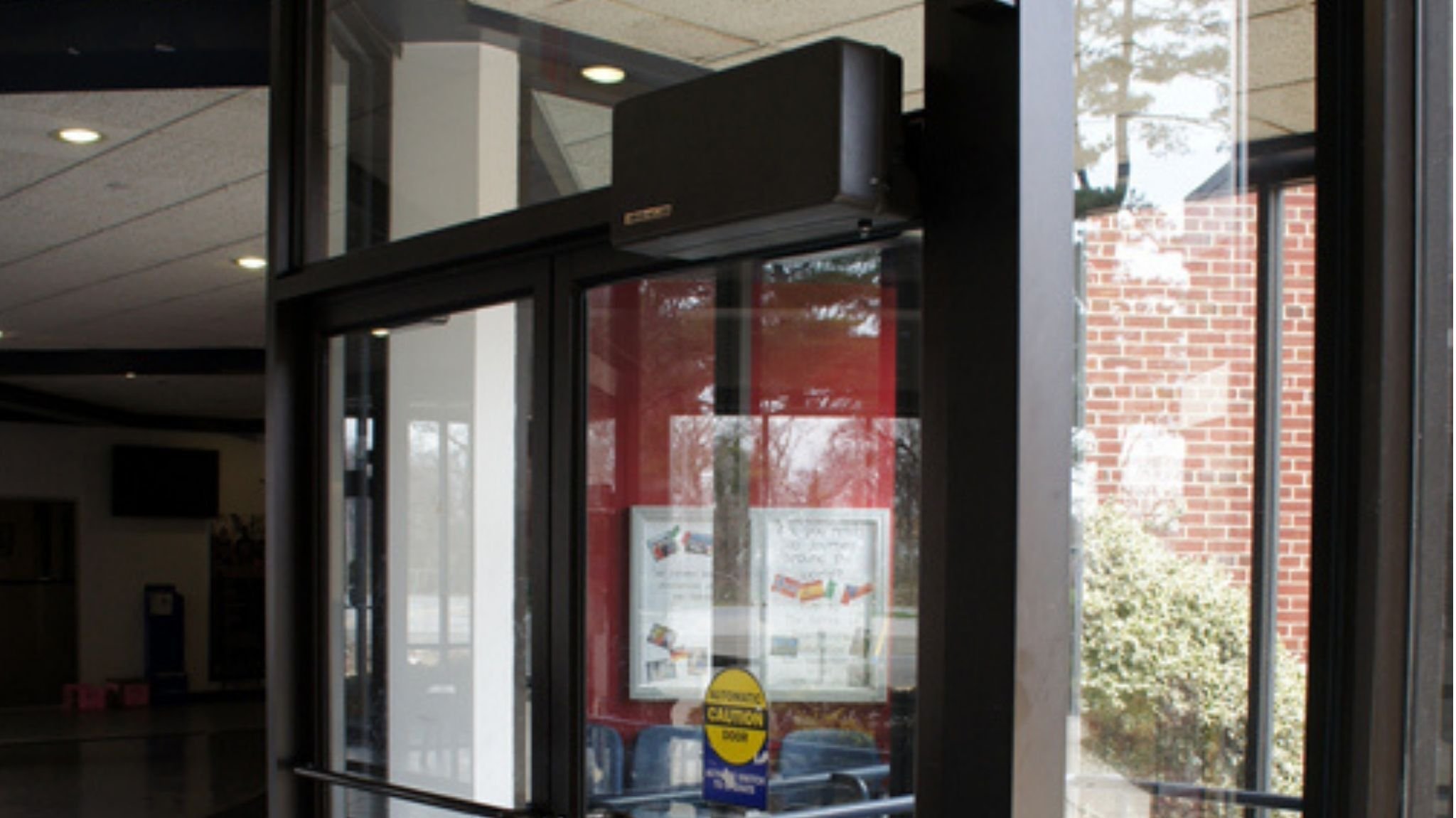 Model 4310R on school entry vestibule doors_16-9